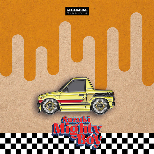 Suzuki Mighty Boy — Gisèle Racing enamel pin on its backing card