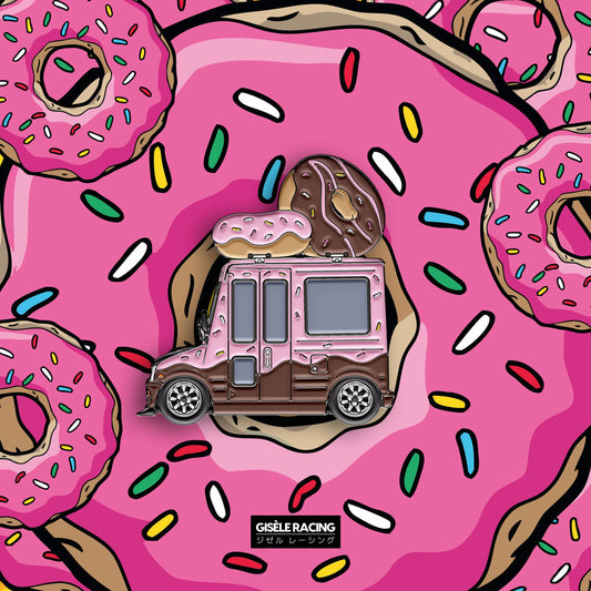 Mira · Donut — Gisèle Racing enamel pin on its backing card