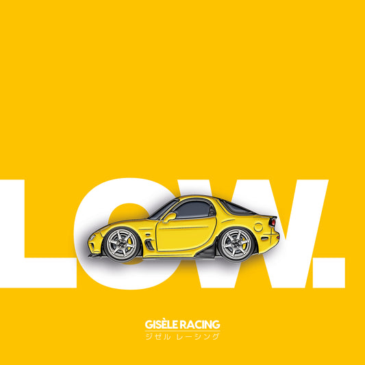 Low. — Gisèle Racing enamel pin on its backing card