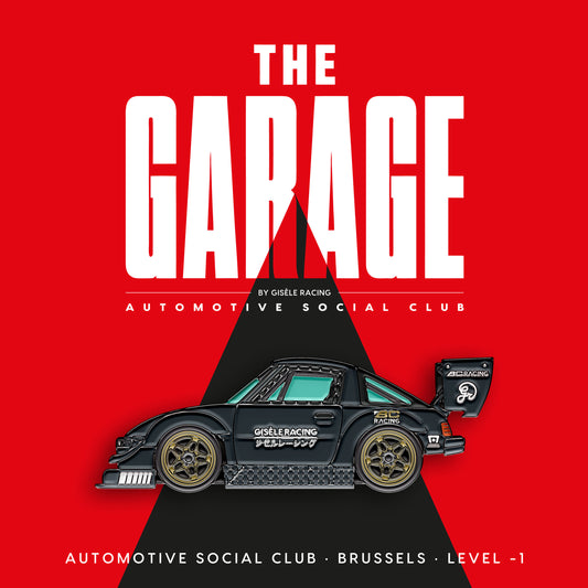 The Garage — Gisèle Racing enamel pin on its backing card
